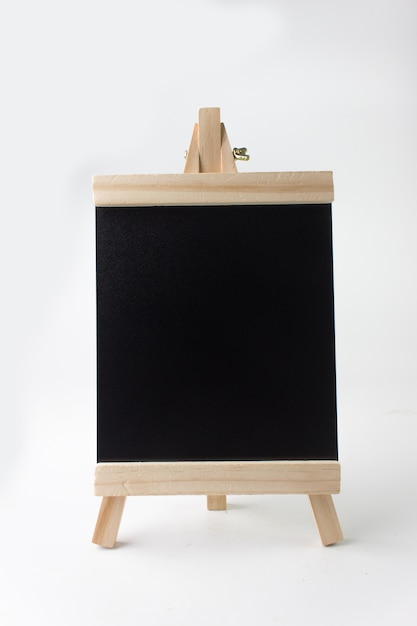 blackboard on wooden stand isolated