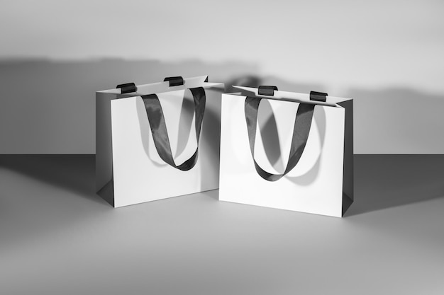 BlackWhite paper glossy shopping bags mockup with black handles