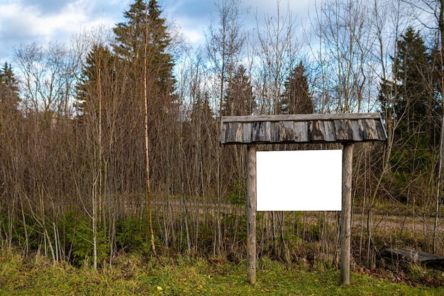 Blank advertising board on nature background