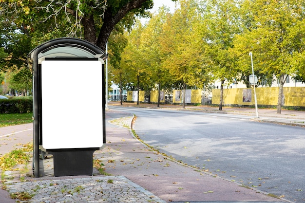 Blank billboard mock up on city road for text message or content.