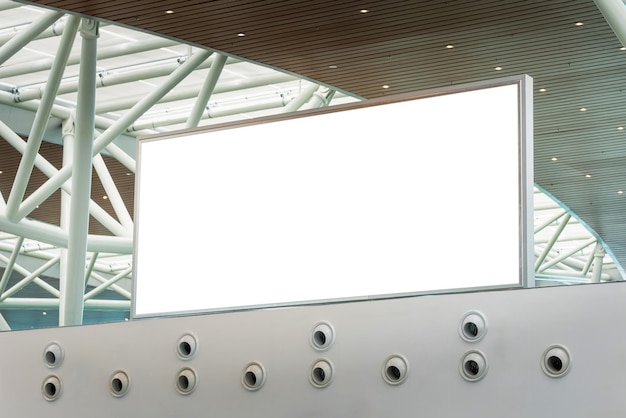 Photo blank billboard signboard in the airport advertising mockup for ad placement advertising in the building