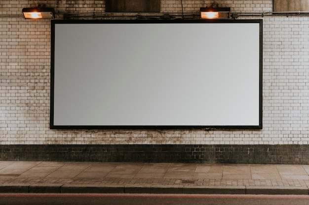 Blank billboard on a white wall