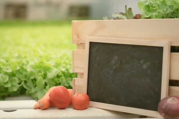 Blank blackboard on a wooden box