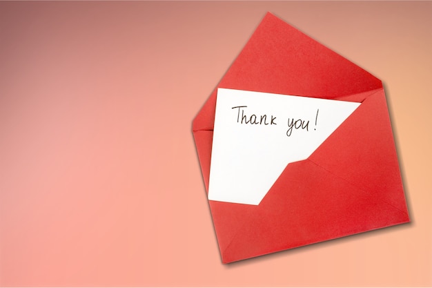 Blank card and envelope with thank you on background