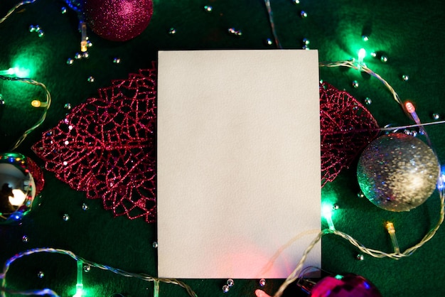 Blank card with Christmas decorations. Christmas card mockup.