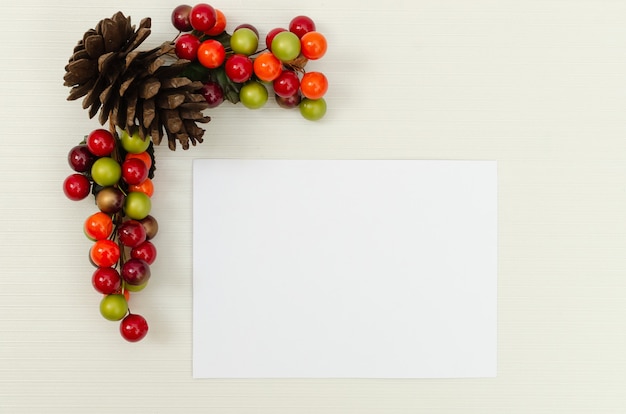 Blank greeting card for christmas with decoration, top view