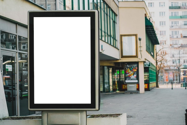 Blank mock up of vertical street poster billboard on city background Advertising Outdoor Business City Event Ad