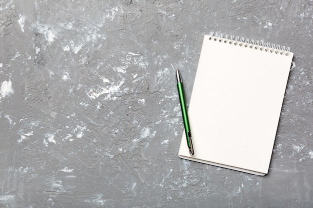 Blank notebook with pen on white background Back to school and education concept