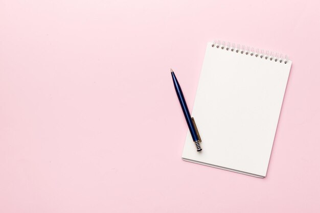 Blank notebook with pen on white background Back to school and education concept