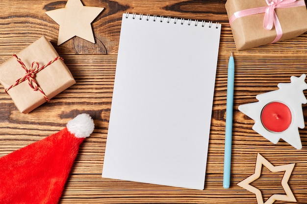 Blank notepad on background of christmas accessories