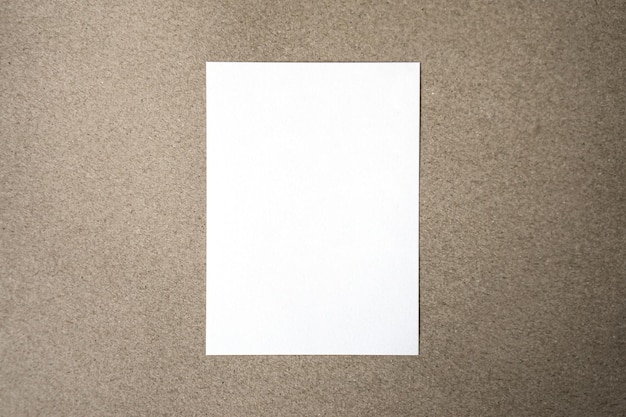 Photo blank paper sheet a3 size on on grey table background