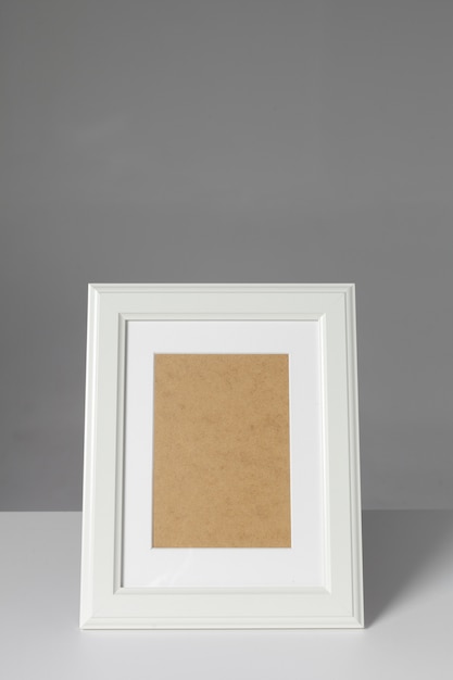 Blank photo frame on the table