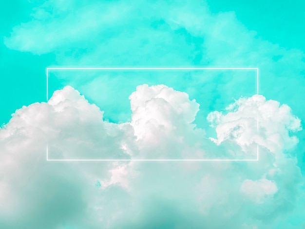 Blank rectangle white glowing light frame on dreamy fluffy cloud with aesthetic green neon sky background. Abstract minimal natural luxury background with copy space.