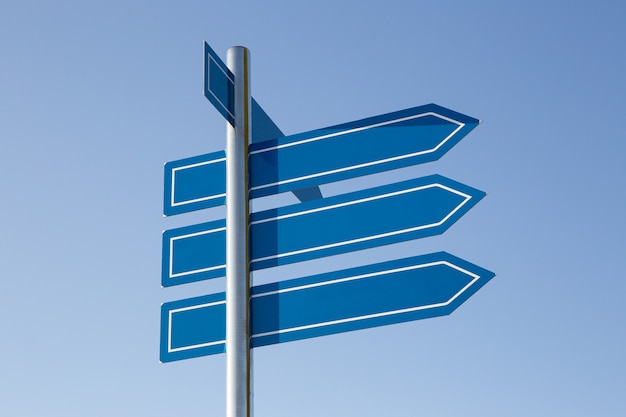 Blank sign post on blue sky. Mock up, template