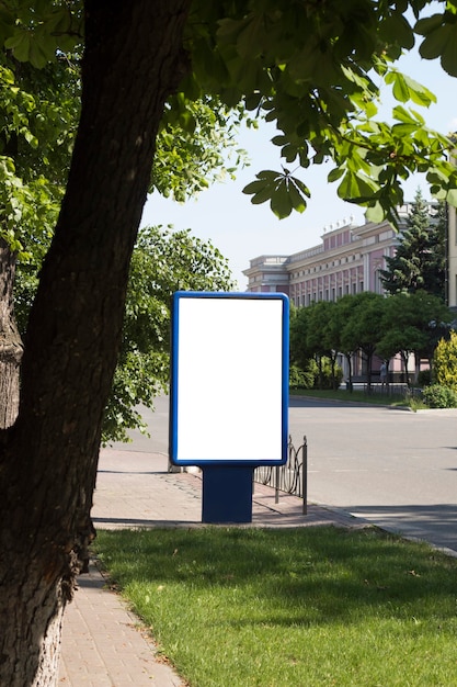 Blank street billboard poster stand on city background