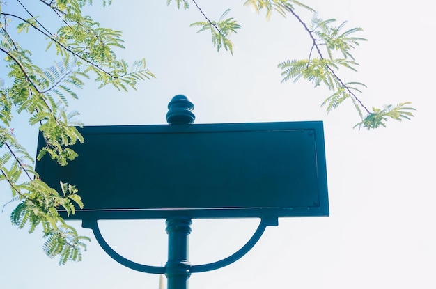 Blank street signwith blue sky background