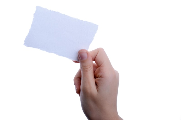 Blank torn notepaper in hand