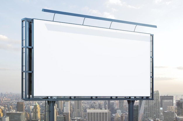 Blank white billboard on city buildings background at daytime, perspective view. Mockup, advertising concept