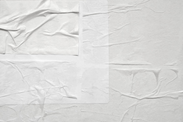 Blank white crumpled and creased paper poster texture