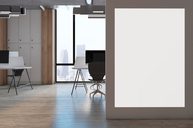 Blank white poster on grey wall with place for your logo in coworking office with black and white furniture modern computers sunlit wooden floor and city view from window 3D rendering mock up