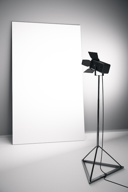 Blank white poster with professional lighting