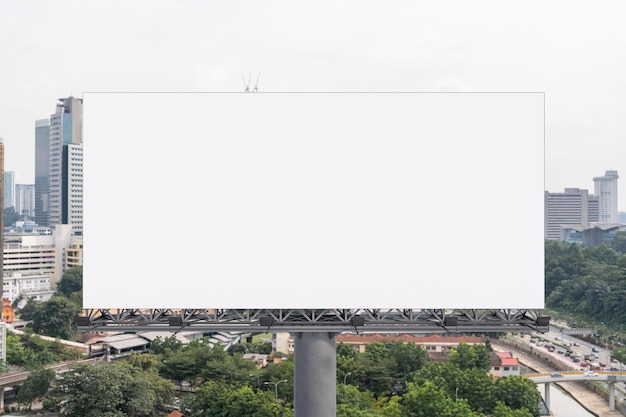 Blank white road billboard with KL cityscape background at day time Street advertising poster mock up 3D rendering Front view The concept of marketing communication to promote or sell idea