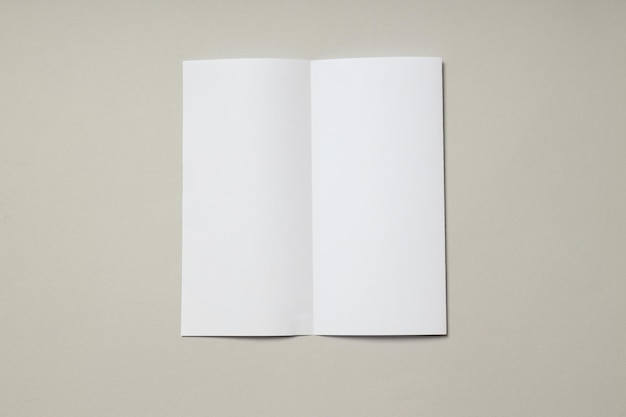 Blank white sheet on light gray background