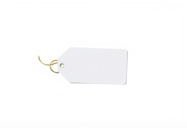 Photo blank white tag with a golden string