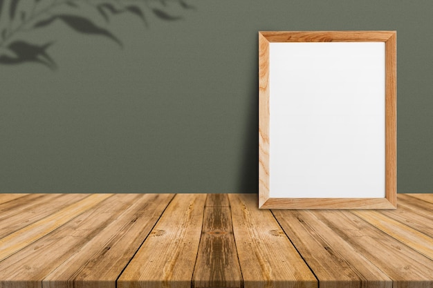 Blank wood frame on tropical wood floor and turquoise paper wall,template mock up for adding your