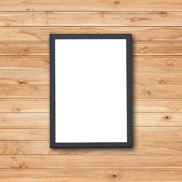 Blank of wooden photo frame on stone wall background 