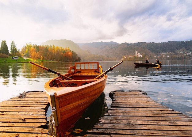 Bled, Slovenia - November 10, 2018: Boat in Bled Lake in Slovenia. Travel in Europe. At sunset