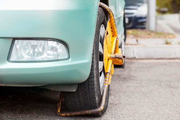 Block on Car Wheel by Wheel Lock. Locking Wheels of vehicle.