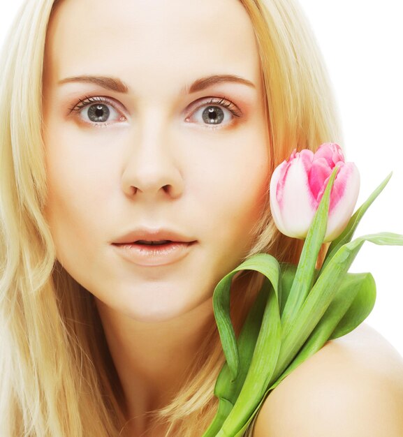 Blonde girl with tulip