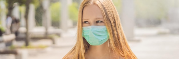 Blonde hair woman in protective surgical mask concept of spread of chinese coronavirus ncov virus