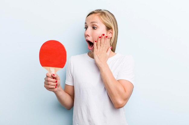 Blonde pretty woman ping pong and sport concept