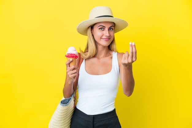 Blonde Uruguayan girl in summertime holding ice cream isolated on yellow background making money gesture