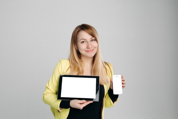 Blonde with moderns gadgets