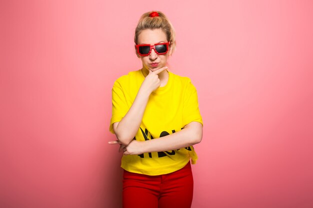 Blonde woman in bright clothes