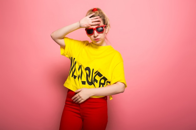 Blonde woman in bright clothes