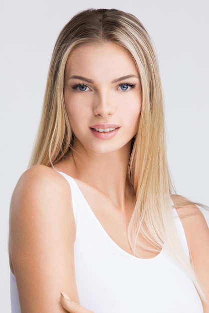 Blonde woman natural beauty closeup portrait