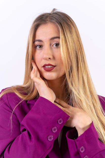 Blonde woman in a portrait isolated on a white background model in a purple trench coat