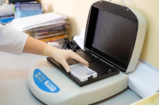 Blood samples for research in microtubes Testing in laboratory Centrifuge for blood analyzing Chemical research Prevention Pneumonia diagnosing COVID19 and coronavirus identification Pandemic