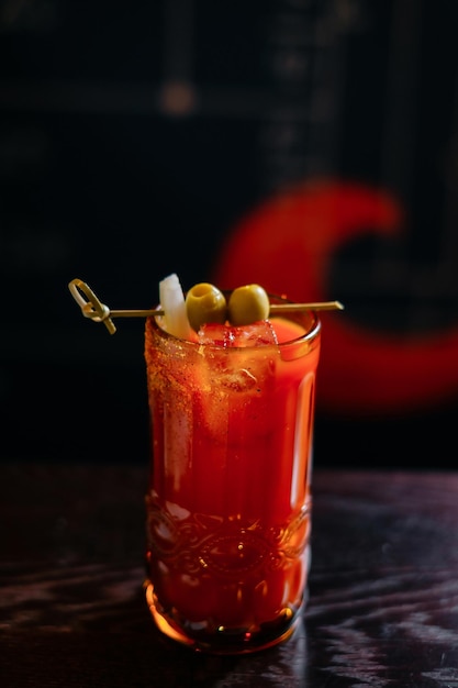 Bloody Mary decorated with olives Making cocktails at home like an expert nightclub barman