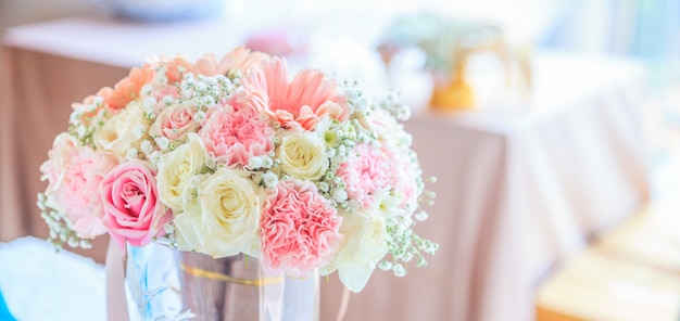 Blooming fresh flower bouquet on reception table background