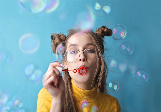 Blowing colorful bubbles