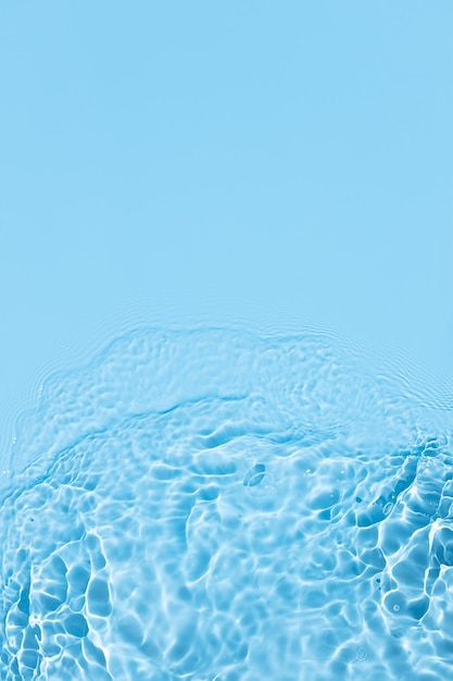 Blue Abstract background texture with water ripples and waves Copy space Top view