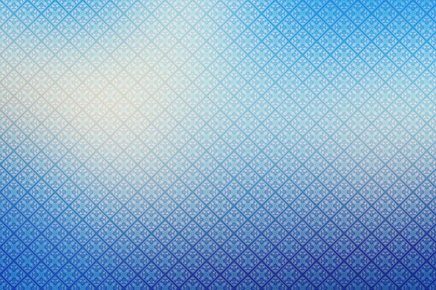 Blue abstract background with a pattern of rhombus