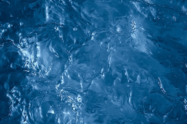 blue background texture water surface flow, abstract water surface