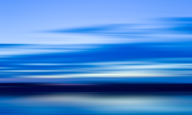 Blue blurred background.