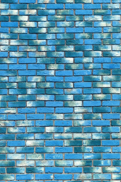 Photo blue brick wall background of modern interior design